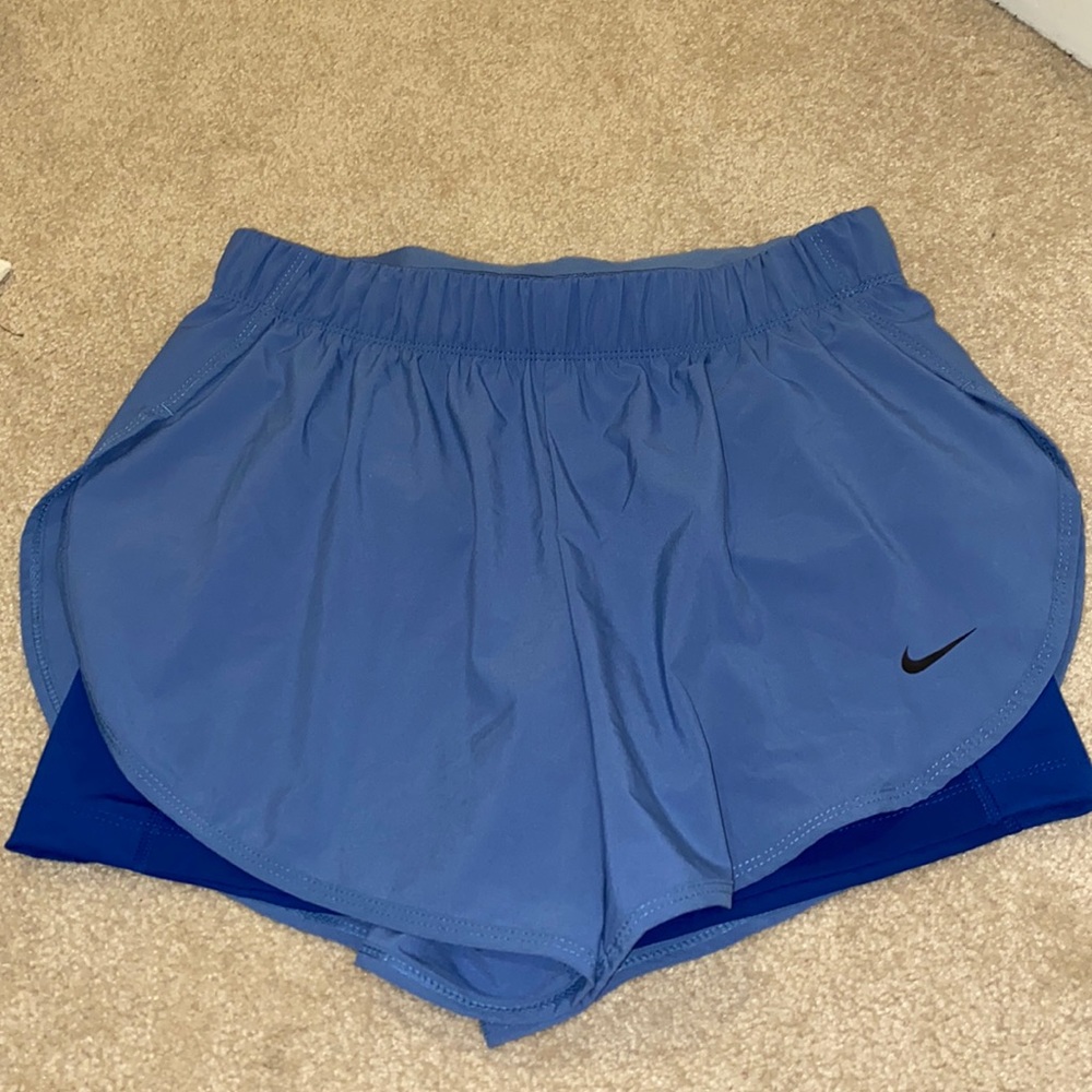 Blue Nike shorts with built in spandex